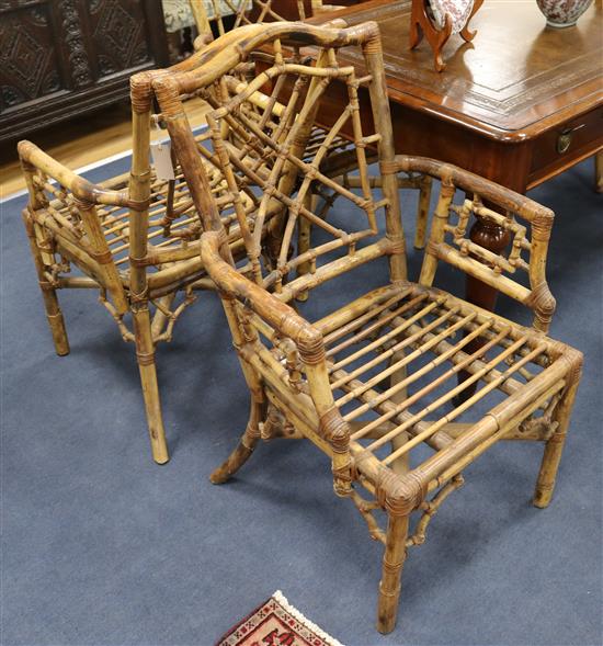 A set of eight Regency design rattan elbow chairs